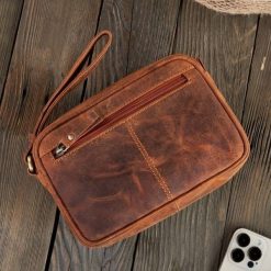 Paolo Peruzzi Saszetka męska skórzana do ręki vintage T-56-LBR. Saszetki męskie Paolo Peruzzi, bez wzorów. Za 168.93 zł.