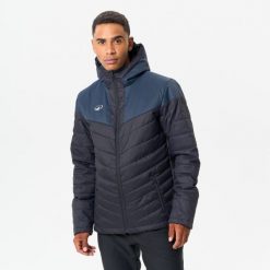 Krótka kurtka do piłki nożnej Kipsta. Czarne kurtki męskie KIPSTA, xl, bez wzorów, sportowe, bez ramiączek, bez kaptura. Za 279.99 zł.
