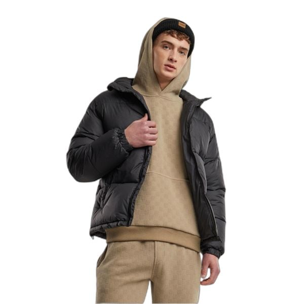 Podstawowa kurtka puchowa z kapturem Urban Classics. Czarne kurtki męskie Urban Classics, m, bez wzorów, z puchu, bez ramiączek, z kapturem. Za 309.00 zł.