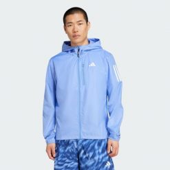 Kurtka Own The Run. Niebieskie kurtki męskie ADIDAS, xl, bez wzorów, z materiału, bez ramiączek, bez kaptura. Za 308.15 zł.