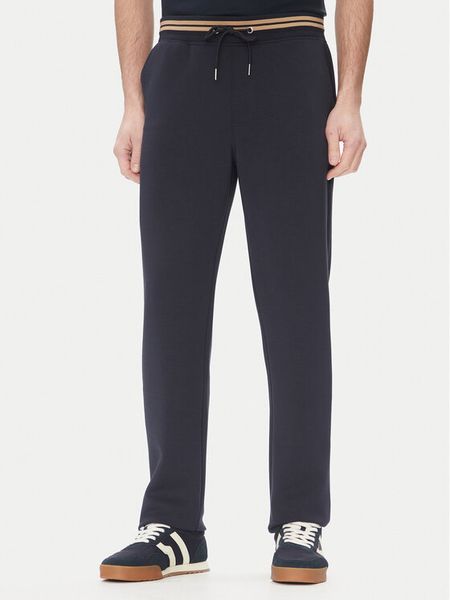 Bugatti Spodnie dresowe 8250 75080C Granatowy Regular Fit. Niebieskie spodnie dresowe męskie Bugatti, bez wzorów, z dresówki. Za 259.99 zł.