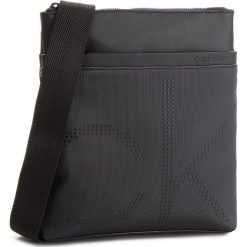 Saszetka CALVIN KLEIN - Ck Poit Flat Crosso K50K503877 001. Saszetki męskie marki Calvin Klein. W wyprzedaży za 279.00 zł.