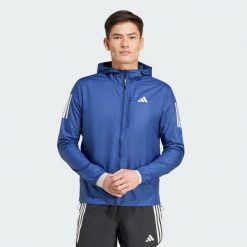 Kurtka Own The Run. Niebieskie kurtki męskie ADIDAS, bez wzorów, bez kaptura, do biegania. Za 379.00 zł.
