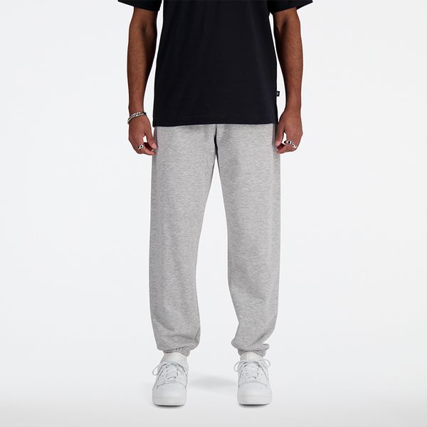 Spodnie męskie New Balance MP41519AG – szare. Szare spodnie dresowe męskie New Balance, bez wzorów, z bawełny. Za 249.99 zł.