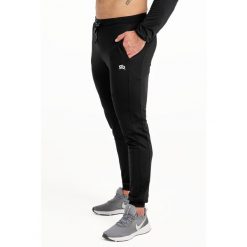 Spodnie fitness męskie Rough Radical Snappy. Czarne długie spodnie sportowe męskie ROUGH RADICAL, bez wzorów, na fitness i siłownię. W wyprzedaży za 119.20 zł.