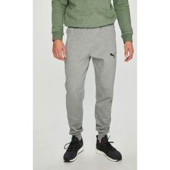 Puma - Spodnie. Zielone długie spodnie sportowe męskie Puma, bez wzorów, z bawełny. W wyprzedaży za 169.90 zł.