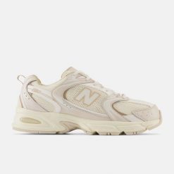 New Balance 530 MR530AA Sneakersy unisex. Brązowe buty sportowe na co dzień męskie New Balance, m, bez wzorów, z syntetyku, sportowe, bez ramiączek, bez kaptura. Za 439.99 zł.