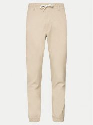 S.Oliver Spodnie materiałowe 2143826 Beżowy Slim Fit. Brązowe spodnie na co dzień męskie S.Oliver, bez wzorów, z bawełny. Za 159.99 zł.