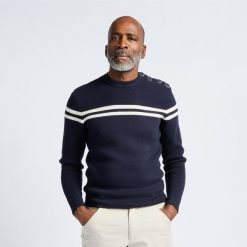 Sweter marynarski męski Tribord. Brązowe swetry męskie TRIBORD, bez wzorów, z bawełny, sportowe, bez kołnierzyka, bez ramiączek. W wyprzedaży za 99.99 zł.
