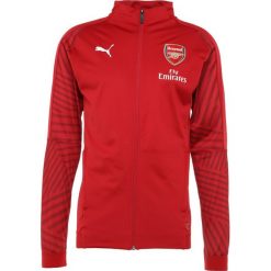 Puma ARSENAL LONDON FC STADIUM JACKET WITH SPONSOR LOGO Artykuły klubowe chili pepper. Kurtki treningowe męskie marki Puma. Za 379.00 zł.
