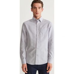 Koszula slim fit z bawełny organicznej - Niebieski. Koszule męskie marki Reserved. W wyprzedaży za 49.99 zł.