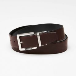 Pasek męski Big Star, naturalna skóra licowa w ciemnobrązowym kolorze z metalową klamrą o matowym wykończeniu oraz klasyczną szerokością do codzienne. Brązowe paski męskie Big Star Accessories, bez wzorów, ze skóry, eleganckie. Za 118.99 zł.