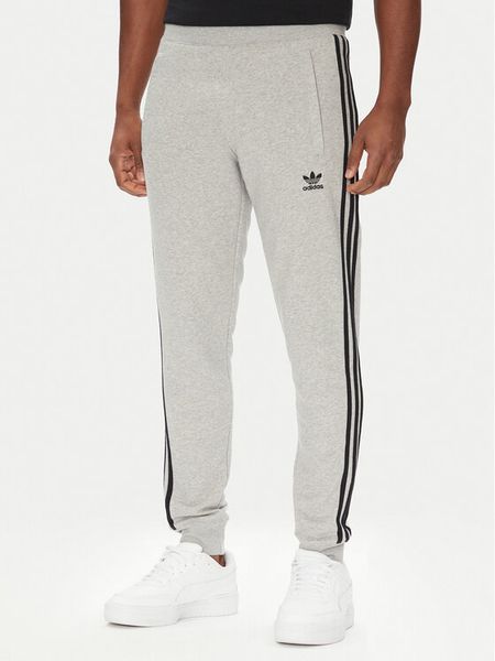 Adidas Spodnie dresowe adicolor 3-Stripes JY1387 Szary Slim Fit. Szare spodnie dresowe męskie ADIDAS, bez wzorów, z bawełny. Za 199.99 zł.
