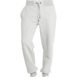 Peak Performance LOGO PANT Spodnie materiałowe medium grey melange. Długie spodnie sportowe męskie marki Peak Performance. Za 479.00 zł.