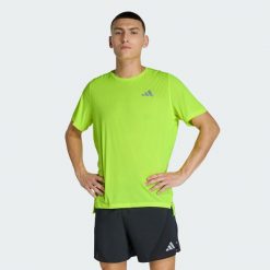 Koszulka adi365Breeze Running. Żółte buty do biegania męskie ADIDAS, bez wzorów, bez zapięcia, do biegania, climacool (adidas). Za 179.00 zł.