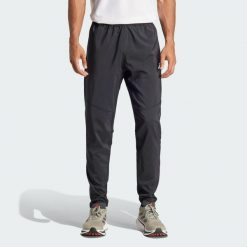 Spodnie Own The Run. Czarne buty do biegania męskie ADIDAS, bez wzorów, z materiału, bez zapięcia, do biegania. Za 242.95 zł.
