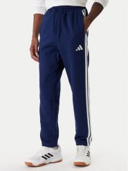 Adidas Spodnie dresowe Essentials 3-Stripes JE6334 Granatowy Regular Fit. Niebieskie spodnie dresowe męskie ADIDAS, bez wzorów, z bawełny. Za 219.99 zł.
