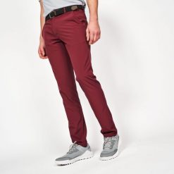 Spodnie do golfa chino męskie Inesis WW500. Fioletowe eleganckie spodnie męskie INESIS, bez wzorów, z elastanu, sportowe. Za 119.99 zł.