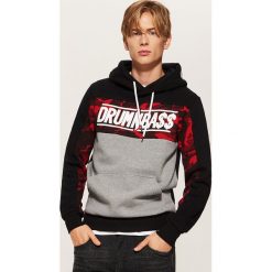 Bluza z napisami - Czarny. Bluzy nierozpinane męskie marki DOMYOS. W wyprzedaży za 69.99 zł.
