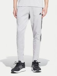 Adidas Spodnie dresowe Tiro IY4288 Szary Regular Fit. Szare spodnie dresowe męskie ADIDAS, bez wzorów, z bawełny. Za 159.99 zł.
