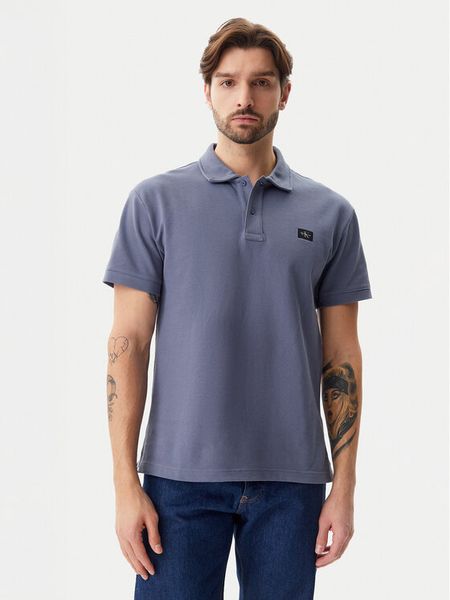 Calvin Klein Jeans Polo J30J327040 Niebieski Regular Fit. Niebieskie koszulki polo męskie Calvin Klein Jeans, m, bez wzorów, z bawełny, bez kołnierzyka, bez ramiączek. Za 199.99 zł.