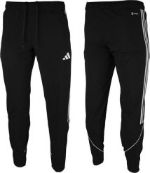 Adidas Spodnie męskie adidas Tiro 23 League Woven czarne IB5012 M. Czarne długie spodnie sportowe męskie ADIDAS, bez wzorów. Za 174.33 zł.
