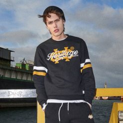 Bluza z kolekcji Heritage - Czarny. Bluzy nierozpinane męskie marki Cropp. W wyprzedaży za 69.99 zł.