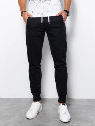 Spodnie męskie dresowe JOGERRY - czarne V1 - Rozmiar: XL. Czarne spodnie dresowe męskie Ombre Clothing, bez wzorów, z bawełny. W wyprzedaży za 49.99 zł.