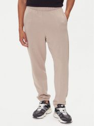On Spodnie dresowe Club Pants 1ME1004 Beżowy Relaxed Fit. Brązowe spodnie dresowe męskie On, bez wzorów, z bawełny. Za 379.99 zł.
