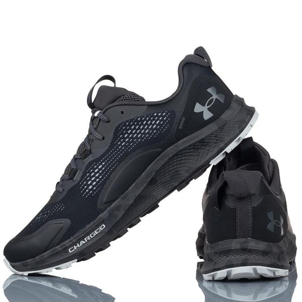 Buty Sportowe Męskie Under Armour Charged Bandit TR 2. Czarne buty do biegania męskie Under Armour, bez wzorów, bez zapięcia, do biegania. Za 409.20 zł.