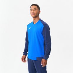Bluza piłkarska dla dorosłych Kipsta T100. Niebieskie bluzy nierozpinane męskie KIPSTA, xs, bez wzorów, z elastanu, eleganckie, bez ramiączek, bez kaptura. Za 69.99 zł.