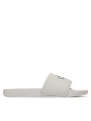 Calvin Klein Jeans Klapki Slide Monogram Cv YM0YM01271 Szary. Szare klapki i japonki męskie Calvin Klein Jeans, bez wzorów, z jeansu. Za 99.99 zł.