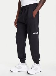 Adidas Spodnie dresowe Essentials Linear Fleece JN1786 Czarny Regular Fit. Czarne spodnie dresowe męskie ADIDAS, bez wzorów, z dresówki. Za 179.99 zł.