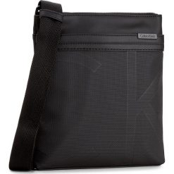 Saszetka CALVIN KLEIN - Greg0ry Flat Crossover G K50K502326 001. Saszetki męskie marki Calvin Klein. W wyprzedaży za 259.00 zł.