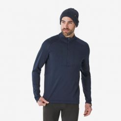 Koszulka termoaktywna narciarska męska Quechua BL 500 1/2 Zip. Niebieskie bielizna termoaktywna męska WED'ZE, l, bez wzorów, z elastanu, bez ramiączek, narciarskie. Za 89.99 zł.