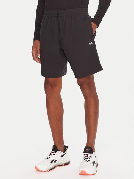 Reebok Szorty sportowe RK25181CCM Czarny Regular Fit. Czarne szorty sportowe męskie Reebok, bez wzorów, z syntetyku, sportowe. Za 99.99 zł.