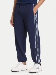 Guess Spodnie dresowe Z6GB11 K3202 Granatowy Regular Fit. Niebieskie spodnie dresowe męskie Guess, z aplikacjami, z dresówki. Za 519.99 zł.
