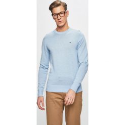 Tommy Hilfiger - Sweter. Niebieskie swetry męskie Tommy Hilfiger, bez wzorów, z bawełny, bez kołnierzyka, bez ramiączek. W wyprzedaży za 299.90 zł.