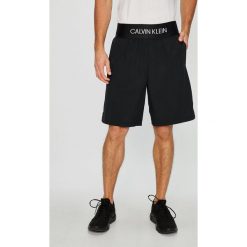Calvin Klein Performance - Szorty. Szare szorty sportowe męskie Calvin Klein Performance, z materiału, sportowe. Za 219.90 zł.
