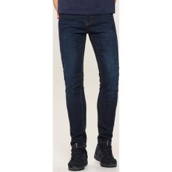 Jeansy skinny - Niebieski. Niebieskie jeansy męskie House, z jeansu. Za 99.99 zł.