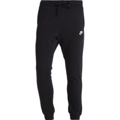 Nike Sportswear Spodnie treningowe black/white. Długie spodnie sportowe męskie Nike Sportswear. Za 379.00 zł.