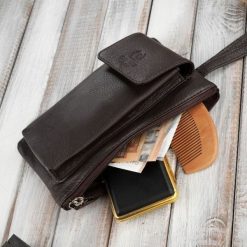 Paolo Peruzzi Saszetka męska skórzana do ręki brązowa T-90-BR. Brązowe saszetki męskie Paolo Peruzzi, bez wzorów. Za 155.19 zł.