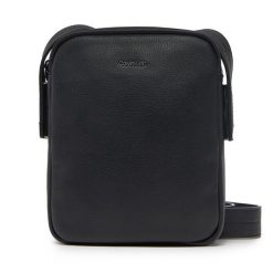 Saszetka Calvin Klein. Czarne saszetki męskie Calvin Klein, bez wzorów, młodzieżowe, małe. Za 239.99 zł.