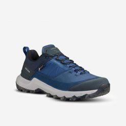 Buty turystyczne męskie Quechua MH500 wodoodporne. Niebieskie buty trekkingowe męskie QUECHUA, bez wzorów, z kauczuku, sportowe, bez obcasa, bez zapięcia. Za 299.99 zł.