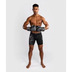 Venum Spodenki Vale Tudo Gladiator 5.0 Czarno-srebrne. Czarne szorty sportowe męskie VENUM, bez wzorów, sportowe. Za 199.00 zł.