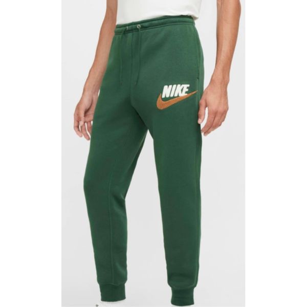 Męskie Dresy Nike. Zielone spodnie dresowe męskie Nike, bez wzorów, z dresówki. Za 320.99 zł.