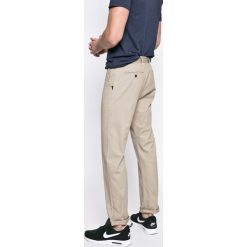 Nike Sportswear - Spodnie. Spodnie na co dzień męskie Nike Sportswear. W wyprzedaży za 139.90 zł.