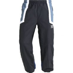 Adidas Originals NOVA WIND Spodnie treningowe carbon/raw steel. Długie spodnie sportowe męskie Adidas Originals. Za 349.00 zł.
