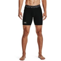 Spodenki męskie Under Armour HeatGear® kompresyjne. Czarne szorty sportowe męskie Under Armour, bez wzorów, z materiału, sportowe. W wyprzedaży za 119.99 zł.