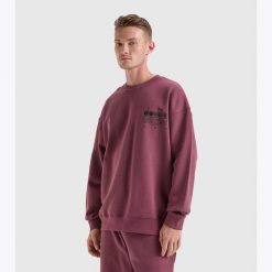 Bluza DIADORA SWEATSHIRT CREW MANIFESTO. Fioletowe bluzy nierozpinane męskie Diadora, m, bez wzorów, bez ramiączek, bez kaptura. Za 139.99 zł.